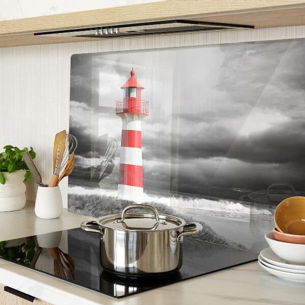 Tabla de cortar de cristal Un faro en el paisaje