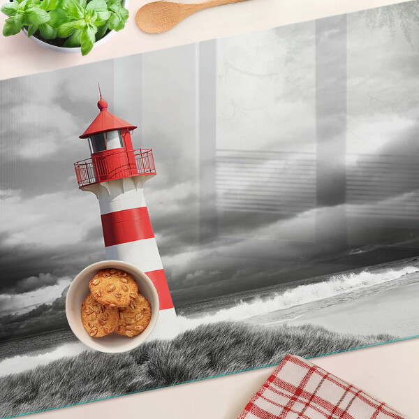 Tabla de cortar de cristal Un faro en el paisaje