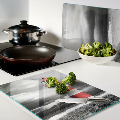 Tabla de cortar de cristal Un faro en el paisaje