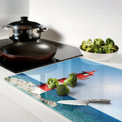 Tabla de cortar Un faro sobre el océano