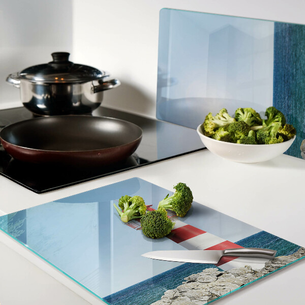 Tabla de cortar Un faro sobre el océano