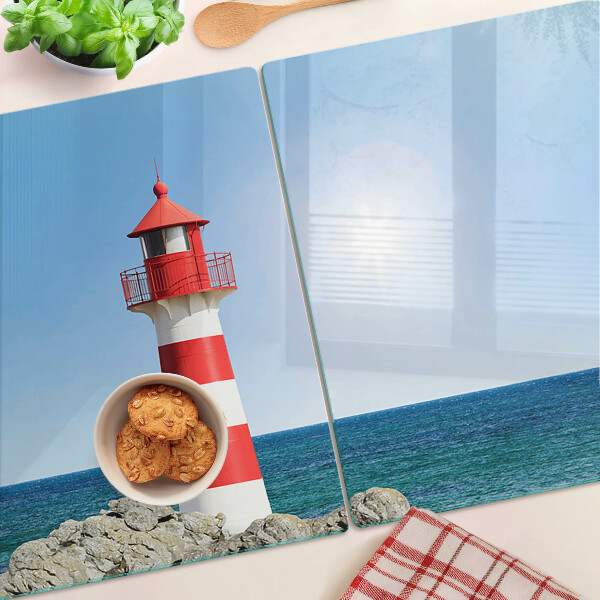 Tabla de cortar Un faro sobre el océano