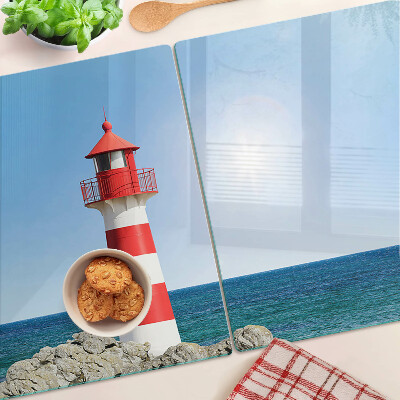 Tabla de cortar Un faro sobre el océano