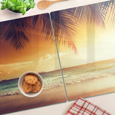 Tabla de cortar Puesta de sol sobre la playa