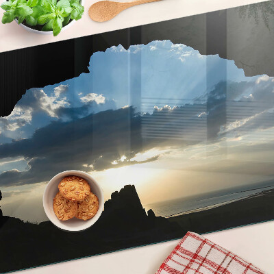 Tabla para cortar Puesta de sol detrás de las nubes