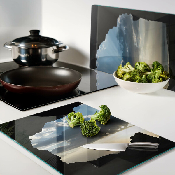 Tabla para cortar Puesta de sol detrás de las nubes