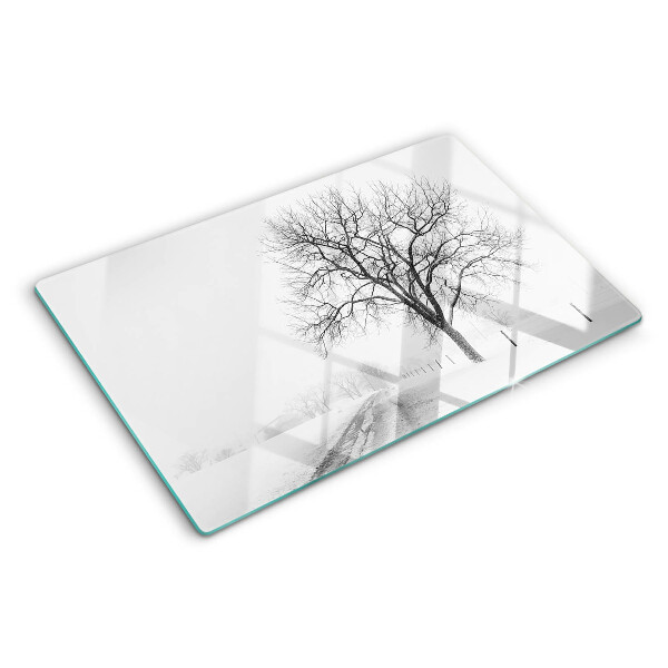 Tabla de cortar de cristal Paisaje invernal vacío con un árbol.