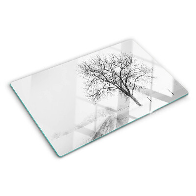 Tabla de cortar de cristal Paisaje invernal vacío con un árbol.