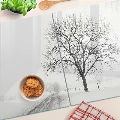 Tabla de cortar de cristal Paisaje invernal vacío con un árbol.