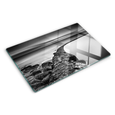 Tabla para cortar Un paisaje costero en tonos grises