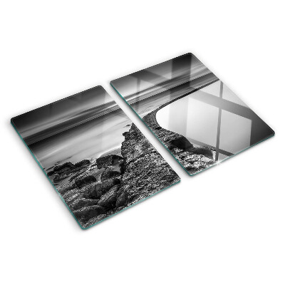 Tabla para cortar Un paisaje costero en tonos grises