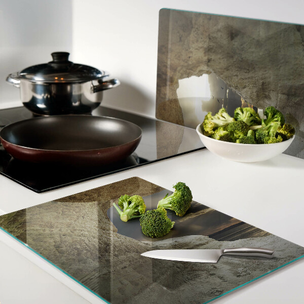 Tabla de cortar Vista del mar a través de la gruta