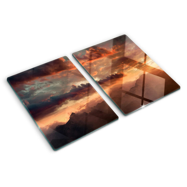 Tabla de cortar de cristal Puesta de sol sobre las montañas