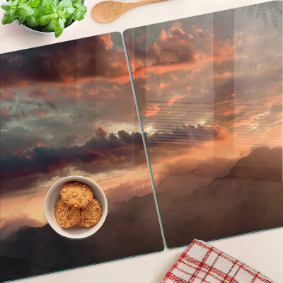 Tabla de cortar de cristal Puesta de sol sobre las montañas