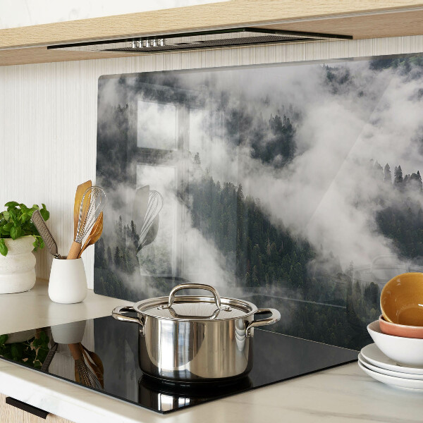 Tabla de cortar de cristal Montañas en las nubes