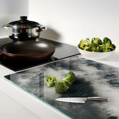 Tabla de cortar de cristal Montañas en las nubes