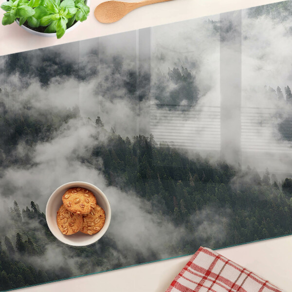 Tabla de cortar de cristal Montañas en las nubes