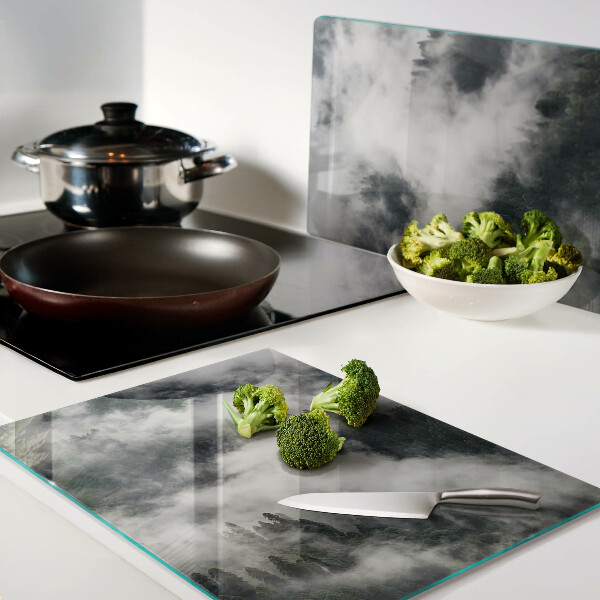 Tabla de cortar de cristal Montañas en las nubes