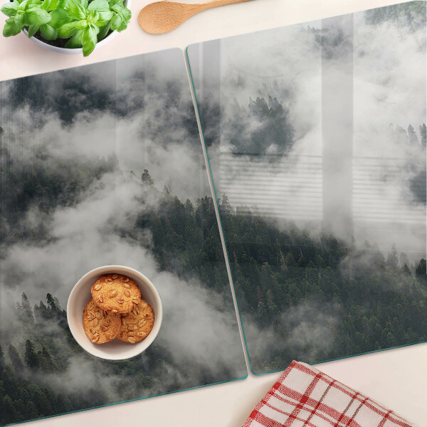 Tabla de cortar de cristal Montañas en las nubes