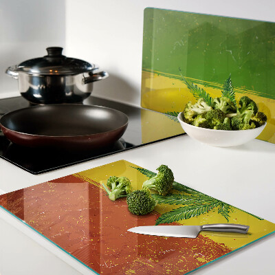 Szklana deska kuchenna Liść konopi na kolorowym tle