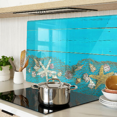 Tabla de cortar Conchas y estrellas de mar en una red