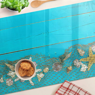 Tabla de cortar Conchas y estrellas de mar en una red