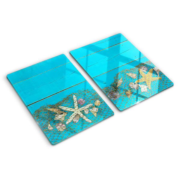 Tabla de cortar Conchas y estrellas de mar en una red