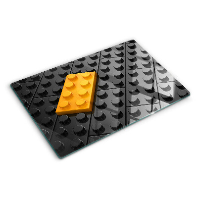 Tabla de cortar de cristal Ladrillos LEGO sobre fondo negro