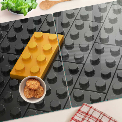Tabla de cortar de cristal Ladrillos LEGO sobre fondo negro