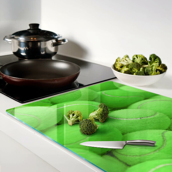 Szklana deska do krojenia Piłki tenisowe na zielonym tle