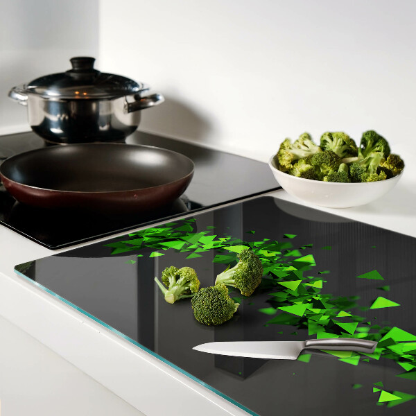 Szklana deska kuchenna Zielone trójkąty na czarnym tle