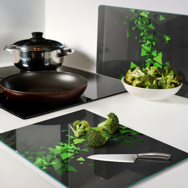 Tabla de cortar de cristal Triángulos verdes sobre fondo negro