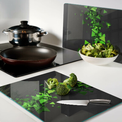 Szklana deska kuchenna Zielone trójkąty na czarnym tle