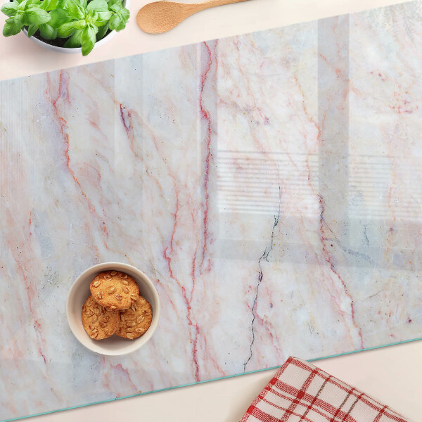Tabla de cortar Patrón de mármol en tonos rosa.