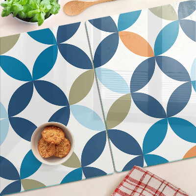 Tabla de cortar Hojas geométricas en diferentes colores.