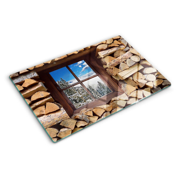 Tabla de cocina Vista de un paisaje invernal a través de la ventana.