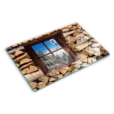 Tabla de cocina Vista de un paisaje invernal a través de la ventana.