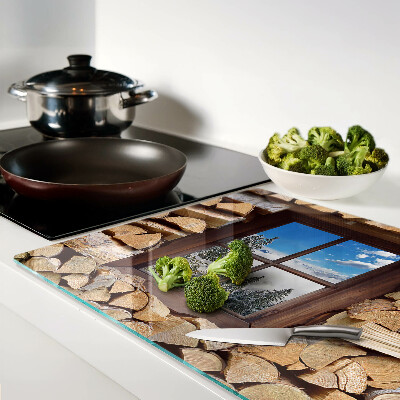 Tabla de cocina Vista de un paisaje invernal a través de la ventana.