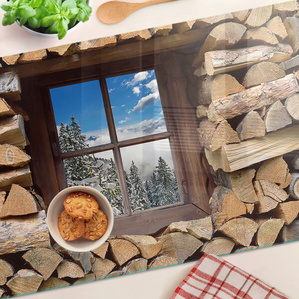 Tabla de cocina Vista de un paisaje invernal a través de la ventana.