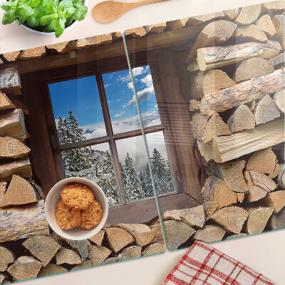 Tabla de cocina Vista de un paisaje invernal a través de la ventana.