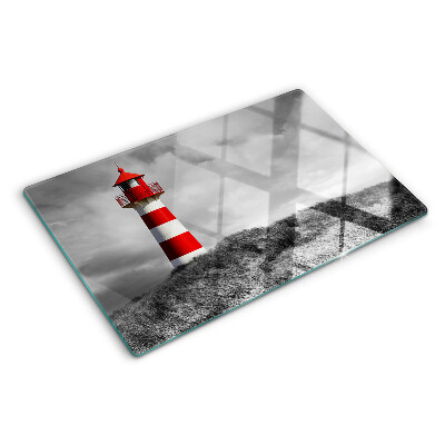 Tabla de cortar Un faro en el paisaje