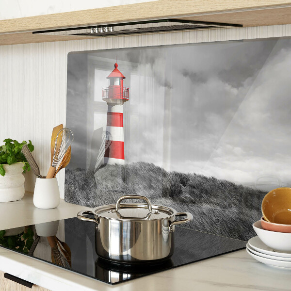 Tabla de cortar Un faro en el paisaje