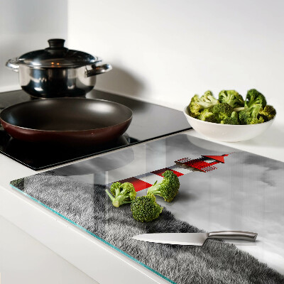 Tabla de cortar Un faro en el paisaje