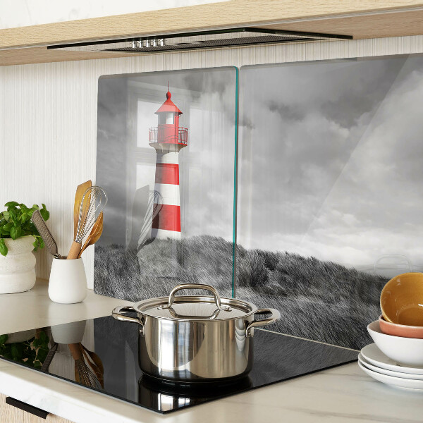 Tabla de cortar Un faro en el paisaje