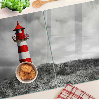 Tabla de cortar Un faro en el paisaje