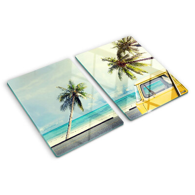 Tabla para cortar Playa con palmeras y un coche.