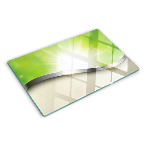 Tabla de cocina Bokeh verde con rayos de luz