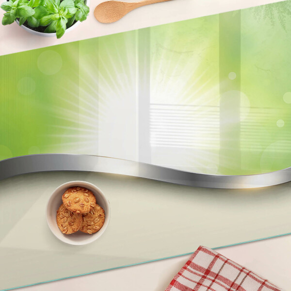 Tabla de cocina Bokeh verde con rayos de luz