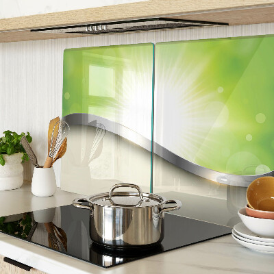 Tabla de cocina Bokeh verde con rayos de luz