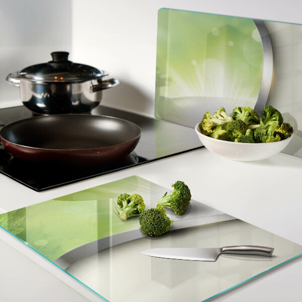 Tabla de cocina Bokeh verde con rayos de luz